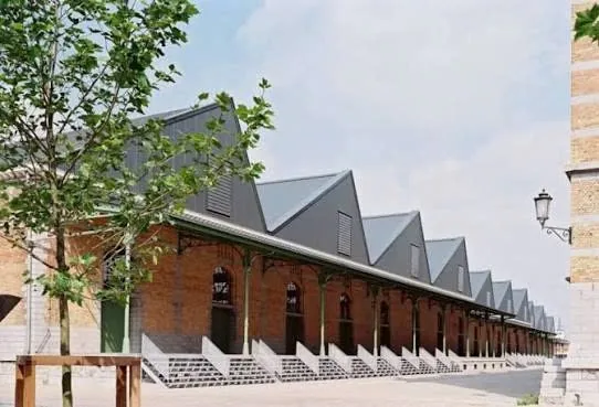 The row of goods sheds along the approach to the site.